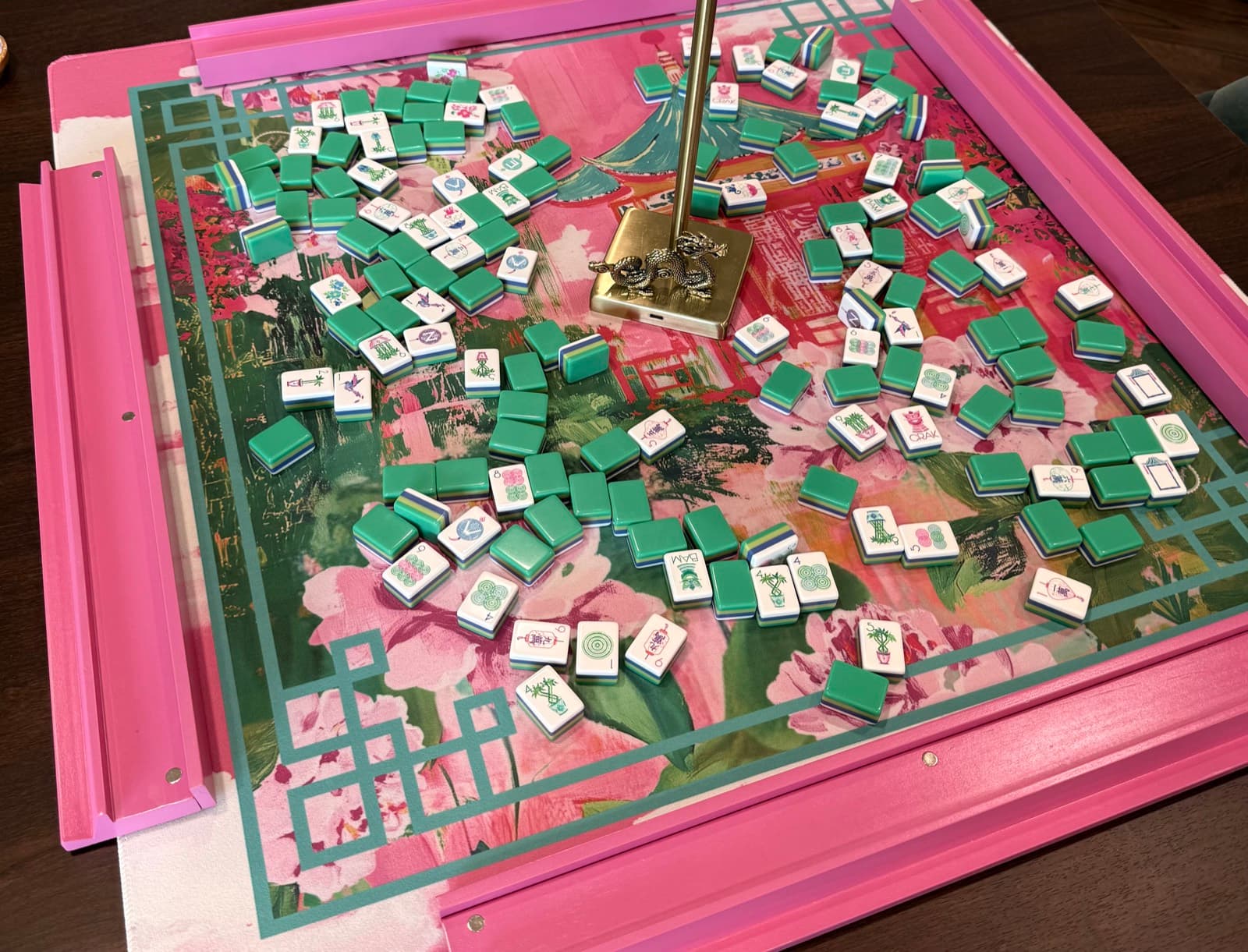 Players enjoying American mahjong at a styled table in Tallahassee.