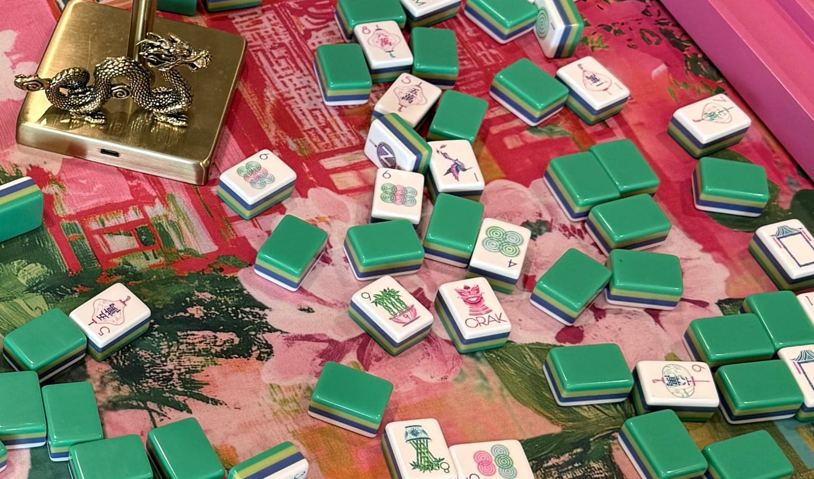 Players enjoying American mahjong at a styled table in Vicksburg.