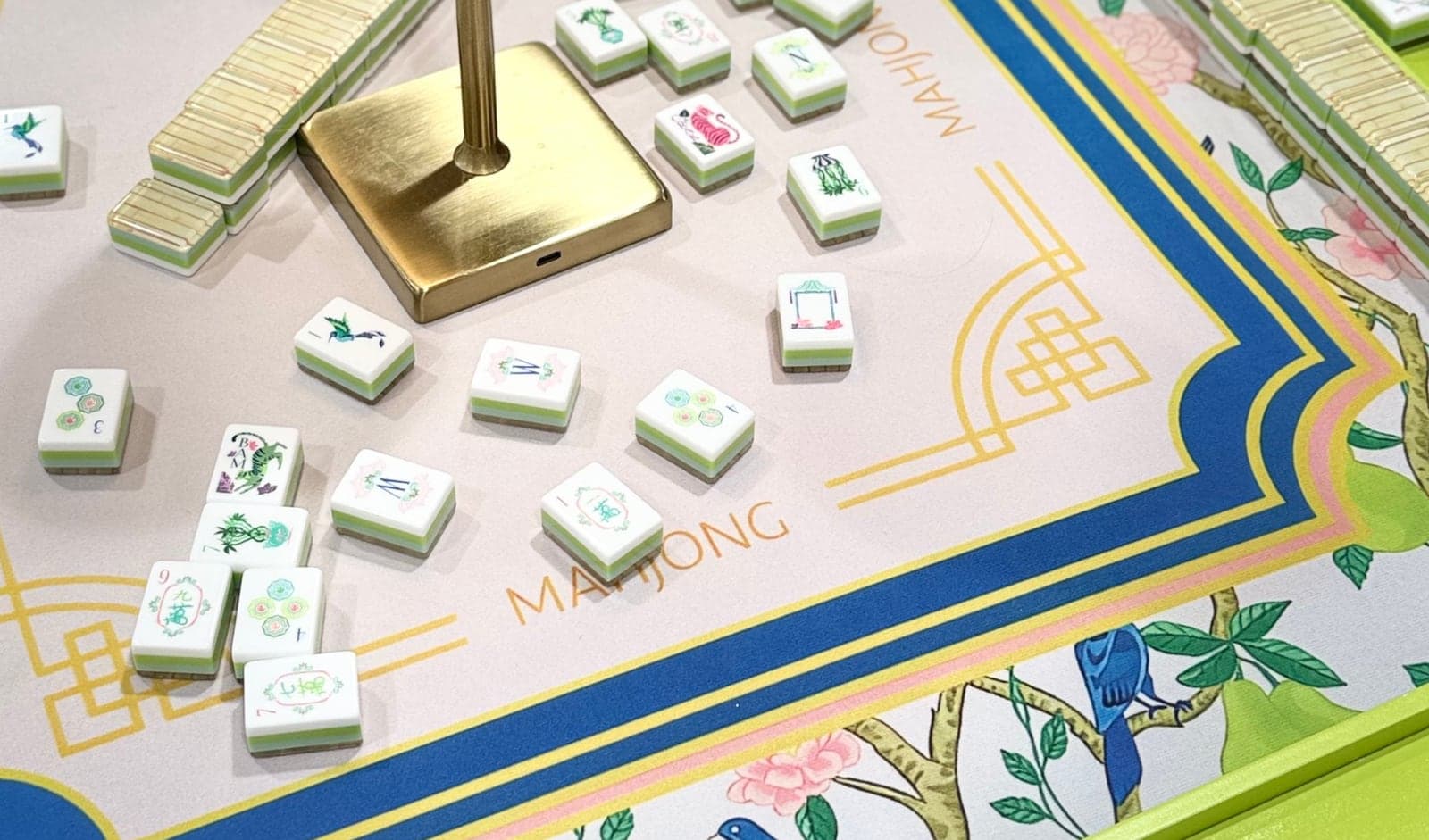 Players enjoying American mahjong at a styled table in Southwest Georgia.
