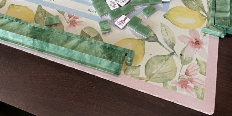 Players enjoying American mahjong at a styled table in Kingwood.