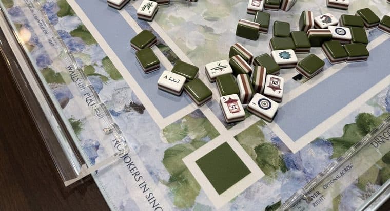 Players enjoying American mahjong at a styled table in Fort Wayne.